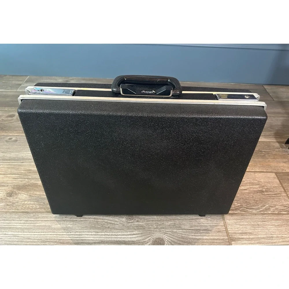 Vintage Oshkosh Black Hard Shell Suitcase Briefcase Style Travel Case Since 1895